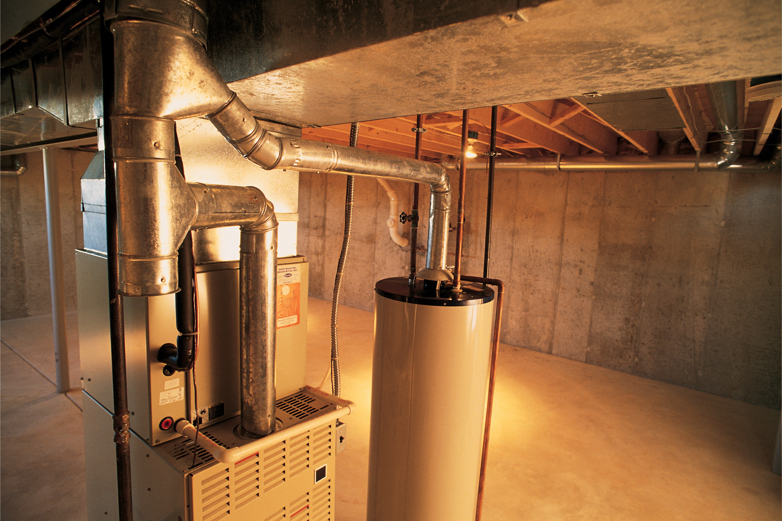 a room with a heater and pipes