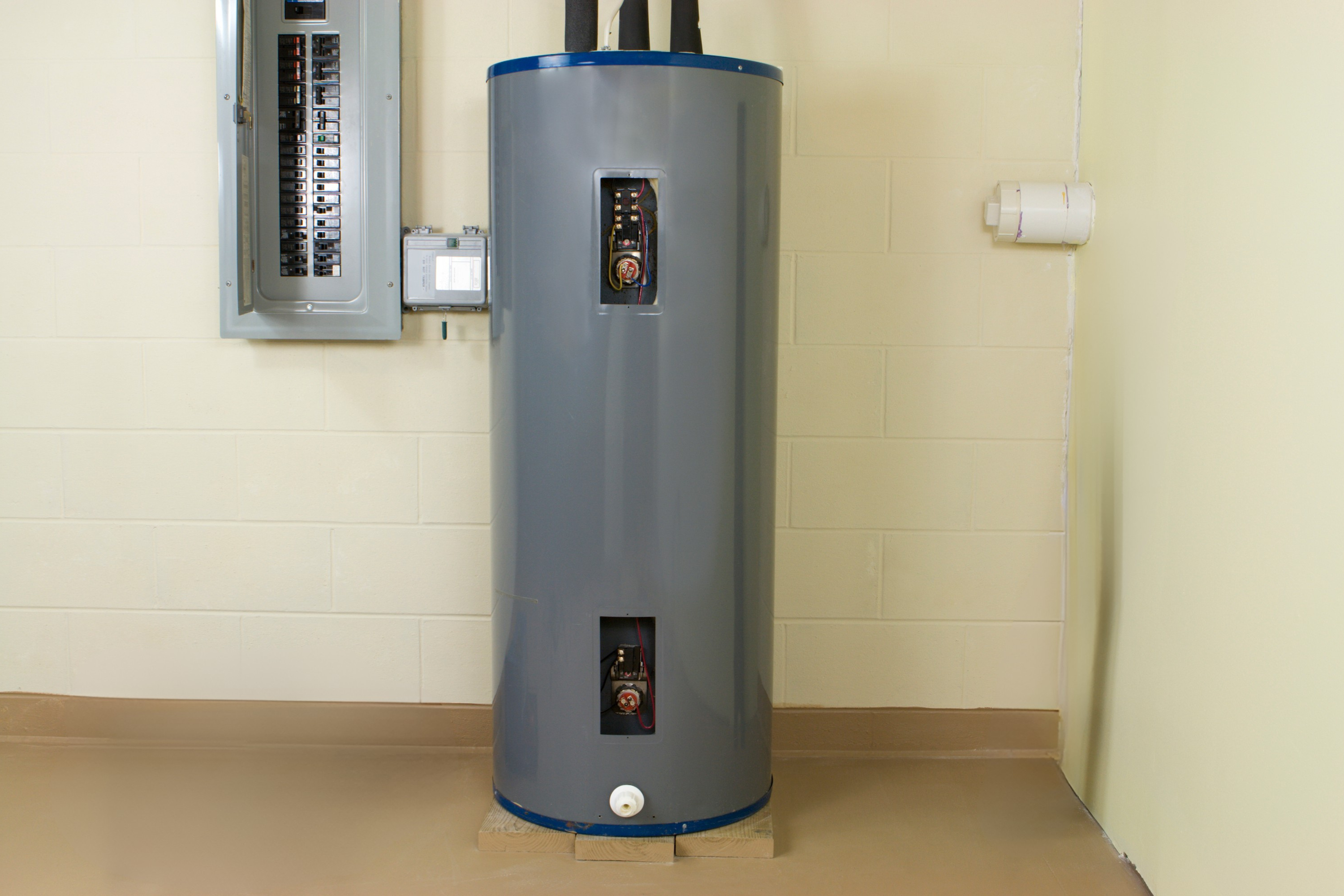a grey cylinder with black pipes