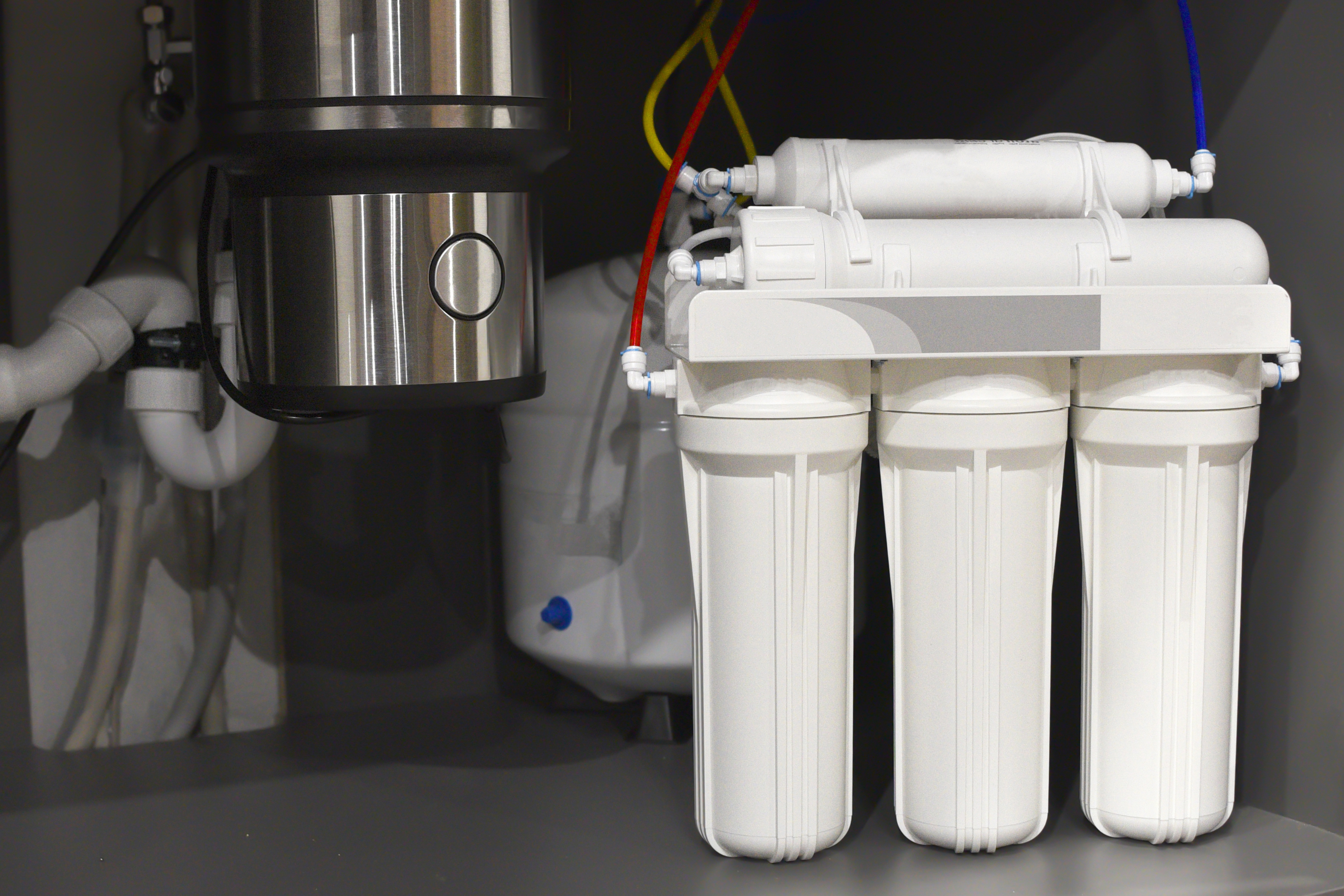 a water filter system with several white filters